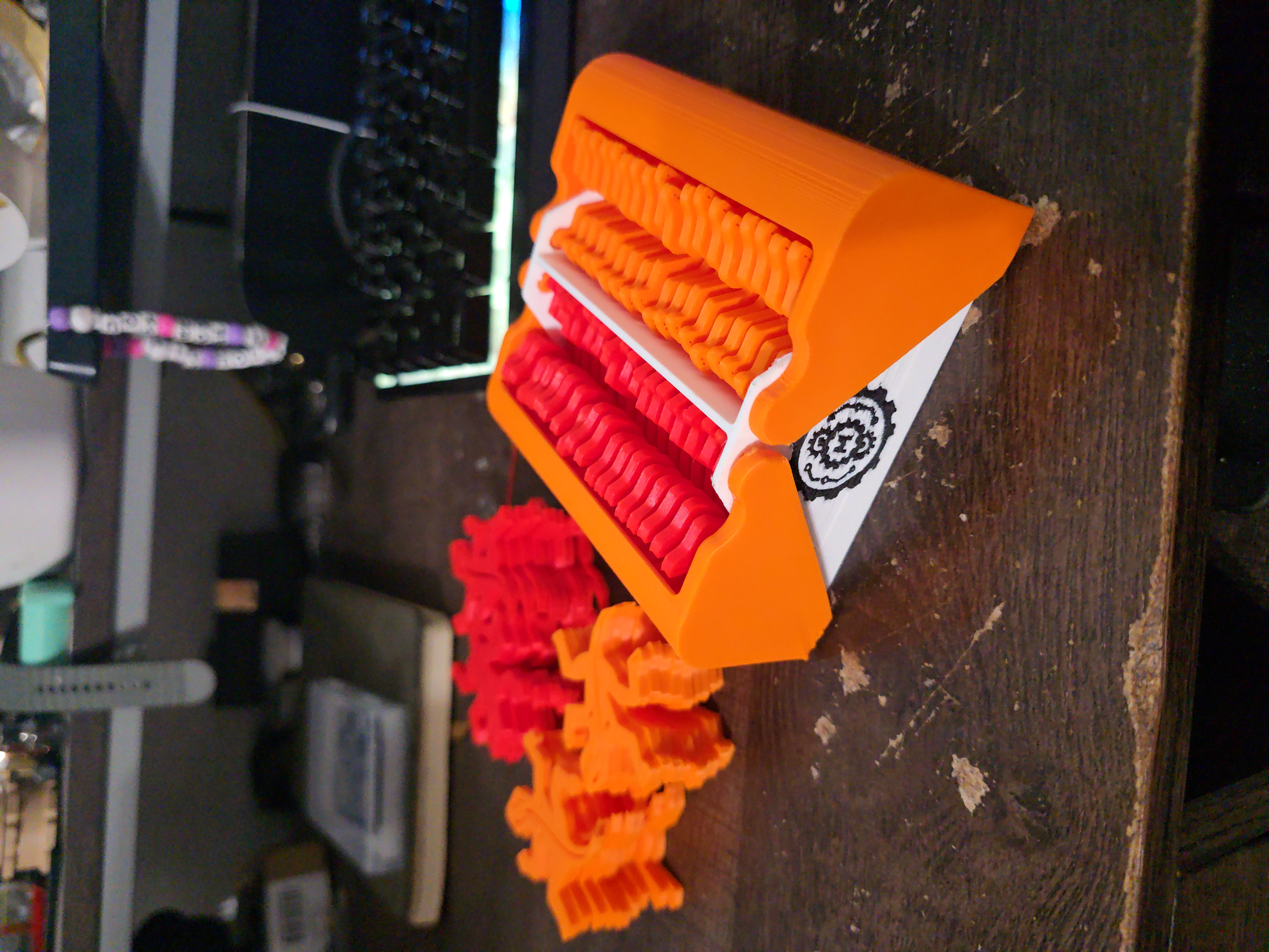 Completed orange M.C. Escher Tessellation toy 3D model